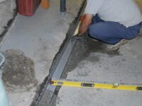 Waterguard Perimeter Basement Drainage channel being installed
